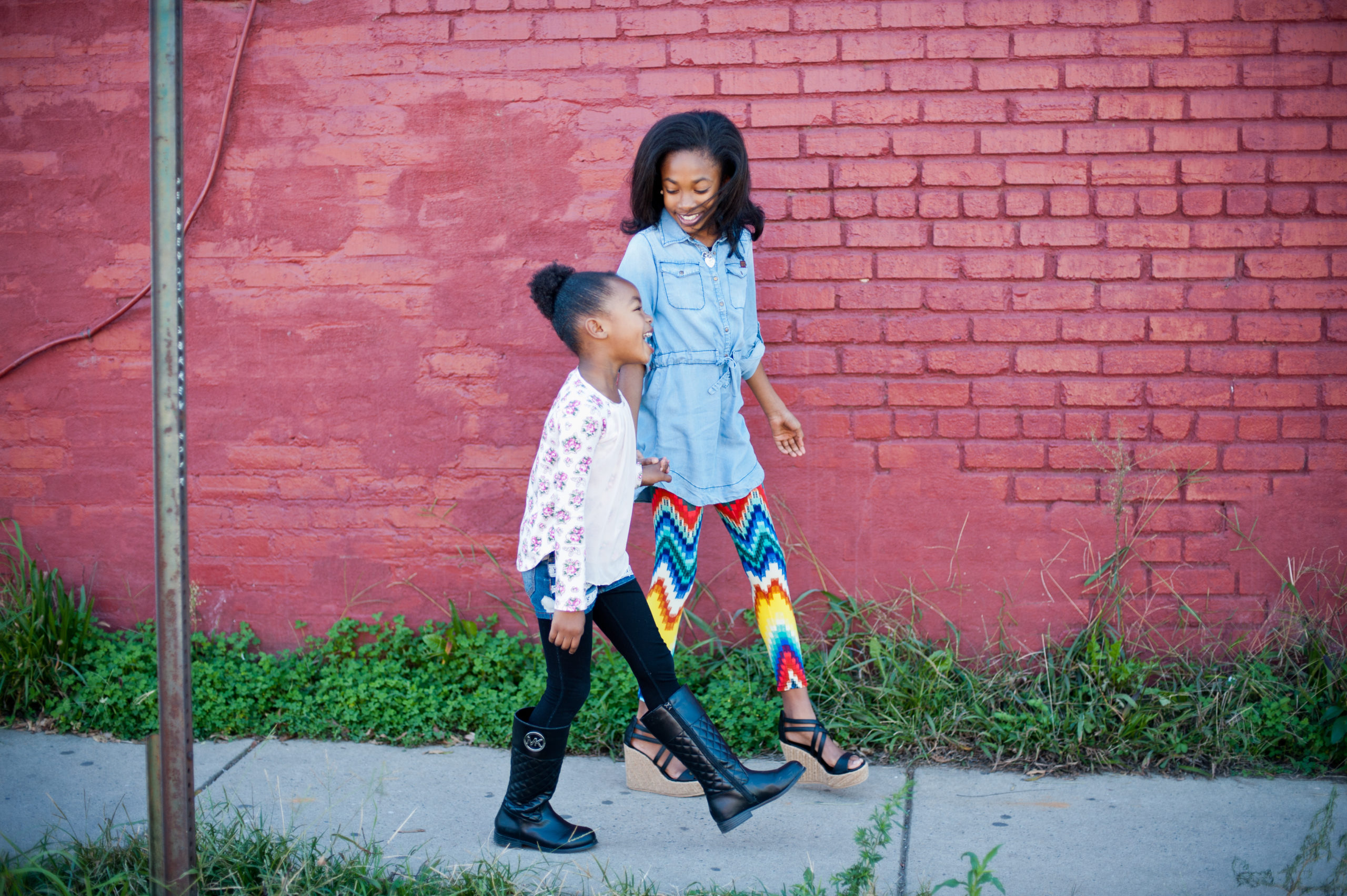 sisters walking by tiona fuller photography